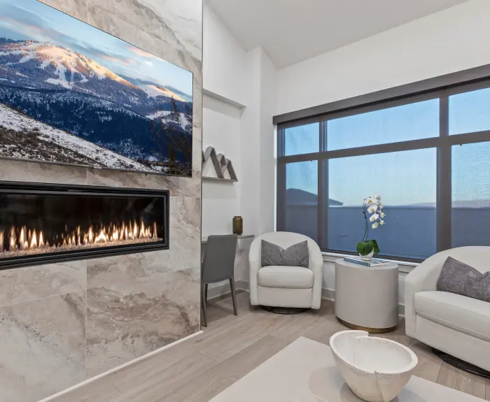 living room of a Life Elevated managed Park City home with a fireplace and lodge-style seating
