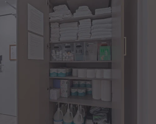 photo of a stocked closet with cleaning supplies